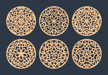 Laser cut patterned coasters, decorative round ornaments.	