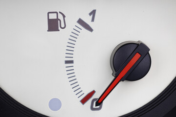 Naklejka premium Empty Fuel Gauge in Car Dashboard Close Up