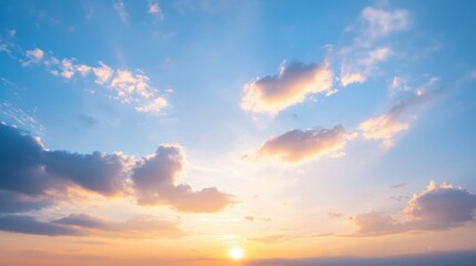 Obraz premium A stunning sunset sky filled with vibrant clouds and soft hues, capturing the beauty of nature at dusk.