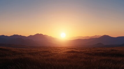 Obraz premium A serene sunrise over rolling mountains, casting warm light on grassy plains, creating a peaceful and picturesque landscape.