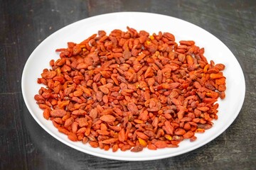 The goji berry, also known as wolfberry pinyin, is the sweet fruit of Lycium barbarum or Lycium chinense, two closely related species of thornbush in the nightshade family, Solanaceae.