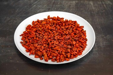 The goji berry, also known as wolfberry pinyin, is the sweet fruit of Lycium barbarum or Lycium chinense, two closely related species of thornbush in the nightshade family, Solanaceae.