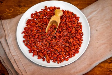 The goji berry, also known as wolfberry pinyin, is the sweet fruit of Lycium barbarum or Lycium...