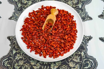The goji berry, also known as wolfberry pinyin, is the sweet fruit of Lycium barbarum or Lycium chinense, two closely related species of thornbush in the nightshade family, Solanaceae.