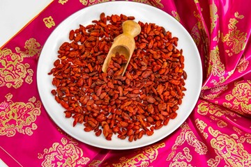 The goji berry, also known as wolfberry pinyin, is the sweet fruit of Lycium barbarum or Lycium chinense, two closely related species of thornbush in the nightshade family, Solanaceae.