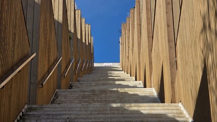 Concrete staircase with wooden walls