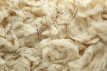 Soft white wool texture as background, closeup