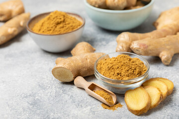 Fresh ginger on wooden background. Dry ginger. Sliced ​​ginger with honey and lemon. Ginger...