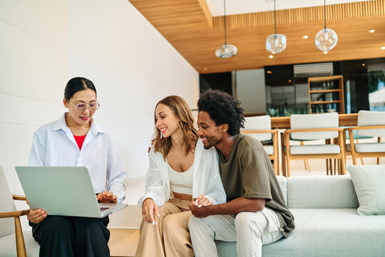 woman man meeting insurance investment couple advice client real estate agent finance customer young adult contract adviser young banking document business agreement laptop