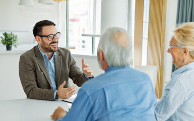 meeting agreement investment couple contract advice retirement consultation house finance senior...