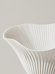Elegant Vase: A close-up shot showcases a beautifully crafted white vase, emphasizing its graceful curves and intricate textured design, evoking a sense of calm and refined beauty.