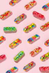 Medical pill capsules filled with colorful sugar sprinkles, creative concept