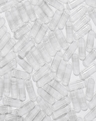 Transparent Empty Gelatin Capsules Background, Pharmaceutical Concept