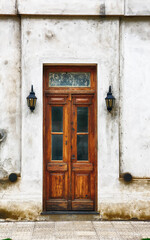 old wooden door in a stone wall