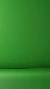 Vertical screen, studio lights illuminate an empty green screen cyclorama wall and floor, creating a smooth and even backdrop perfect for visual effects and compositing