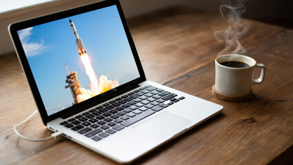Fototapeta premium Laptop Showing Rocket Launch 