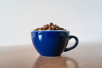 cup of coffee with beans