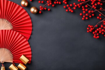 Red fans gold ornaments and red berries on dark background