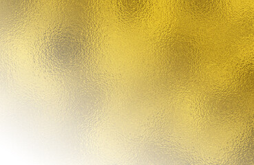 shiny grainy gold foil texture. holiday celebration theme christmas gift package luxury glossy golden paper abstract background.