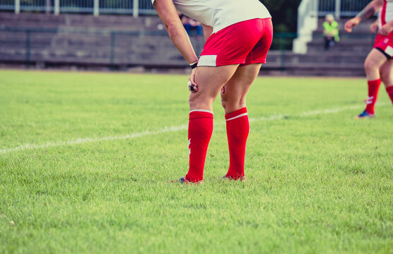 Male rugby players. Football boots
