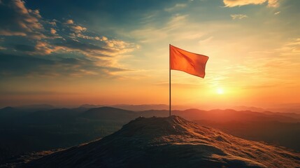 A scenic mountain peak bathed in golden sunlight, with a narrow path leading to a single flag pole adorned with a blue flag.