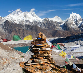 Mounts Everest Lhotse Makalu with buddhist prayer flags