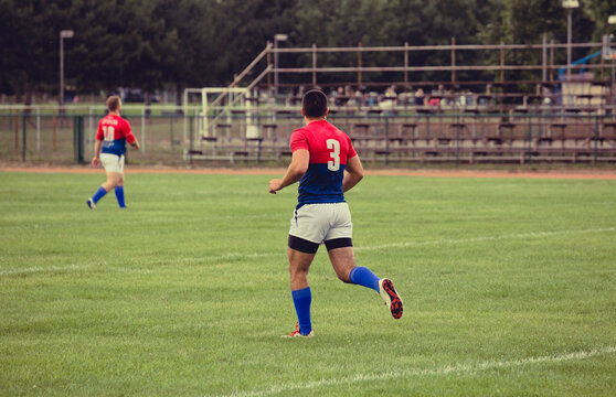 Rugby player running on the field