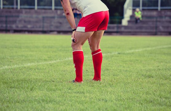 Male rugby players. Football boots. Rugby match