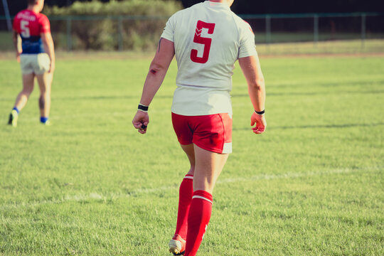 Rugby sportsman walking on the field