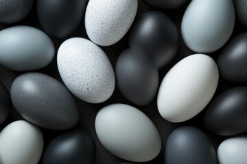 A collection of stylish Easter eggs in black, grey and white hues adorns the background, made with Generative AI