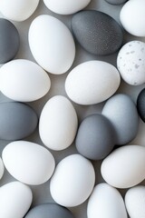 A stunning minimal background of matte grey and white easter eggs , made with Generative AI