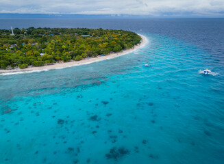Balicasag Island Panglao Bohol. Panoramic drone aerial view of lonely round island in Philippines