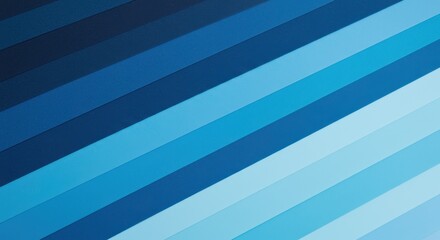 Obraz premium A diagonal layout of paper strips in varying shades of blue from deep navy to light sky blue