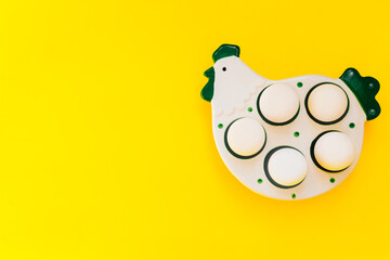 Stand for great eggs in the rustic style in the shape of a trigger