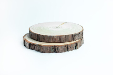 Clean and minimalist, two natural wooden slices stacked elegantly against a white background, perfect for rustic or eco-friendly presentations, craft projects, or simple decorative designs.