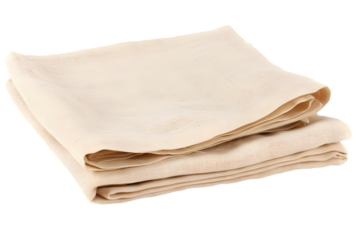 Collection of neatly folded natural fabric linen displayed on a white background, showcasing a simple and elegant textile choice for home decor
