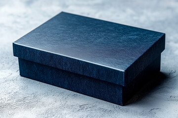 Closed Dark-Blue Rectangular Cardboard Box on Gray Surface