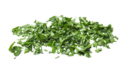Fototapeta premium Chopped green parsley leaves isolated on white