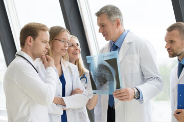 Fototapeta premium a group of doctors are meeting in a hospital