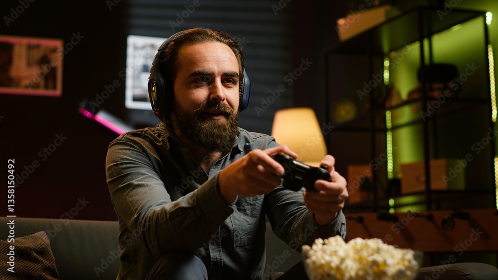 Poster excited man playing videogames using controller, having fun in neon illuminated room. enthusiastic g