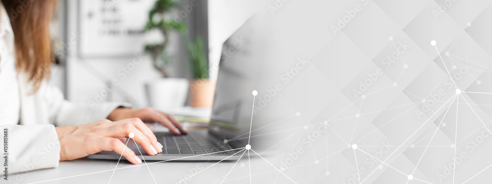 Poster cropped closeup shot of businesswoman using laptop and typing on keyboard, sitting at table in cowor