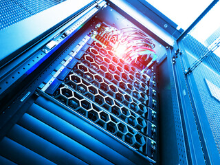Modern Server Rack with High-Tech Networking Equipment and Cables