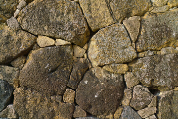 Himeji, Japan - Sep 24 2024, Close-up view of the cobblestone fortress wall, consisting of large...