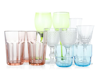 Many empty clean glasses isolated on white