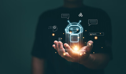 Artificial Intelligence (AI) technology concept, Businessmen holding icon of AI chatbot and Ai application, Chatbot conversation assistant automatic service , Provide access to online information..