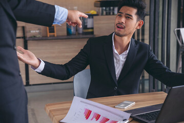 Recession Stress man using laptop work hard at home office headache, depressed from failure business burnout. Tired Asian man despair stress overworked pain sadness life problems frustration.