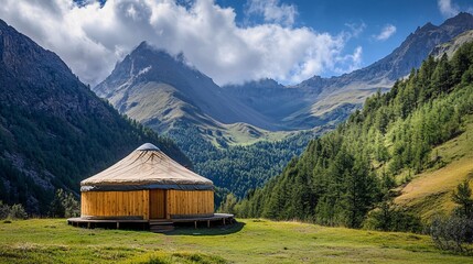 Secluded wooden yurt nestled in serene alpine valley scenery