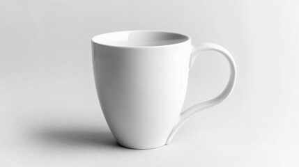 Obraz premium Elegant white mug on pristine background offering versatile usage showcase