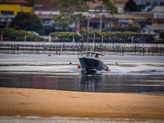 Black Hulled Boat In Merimbula River
