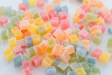 Colorful Sugar-Coated Jelly Candy Cubes on White Background